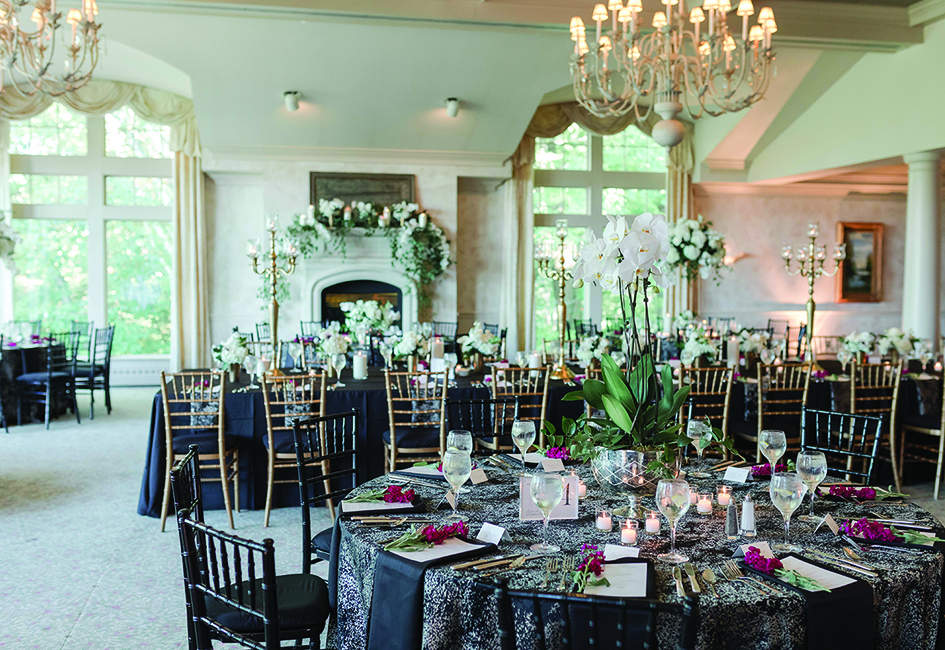 The dining room at the Oneida Golf and Country Club set up for a wedding.